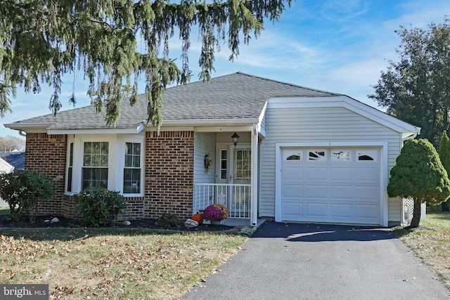 ranch-style home with a garage