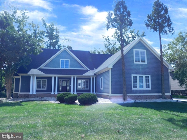 view of front of home with a front lawn