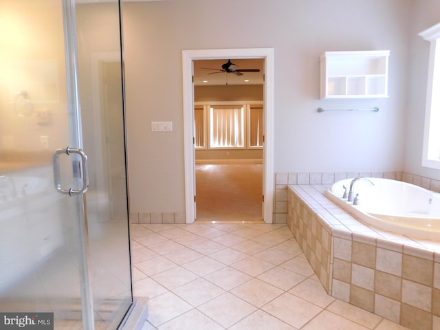 bathroom featuring tile patterned floors, plus walk in shower, and ceiling fan