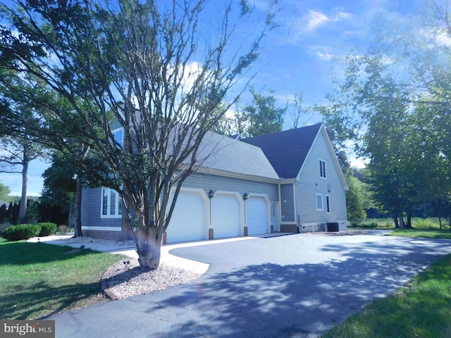 view of property exterior with a garage