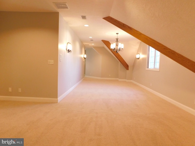 additional living space featuring an inviting chandelier, carpet, and vaulted ceiling