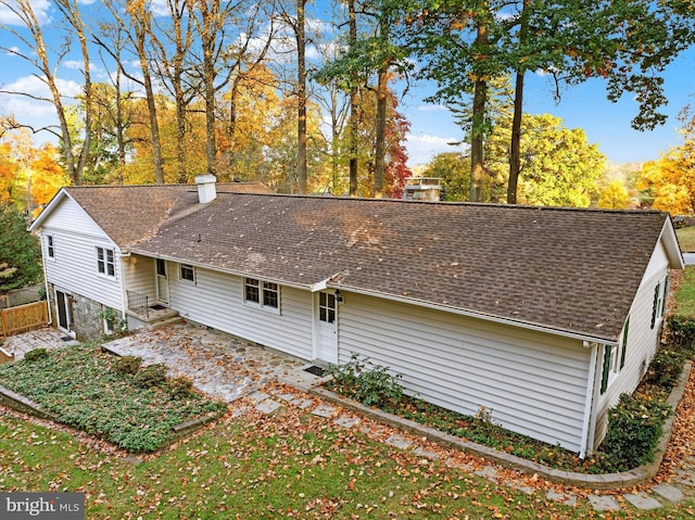 back of house with a patio