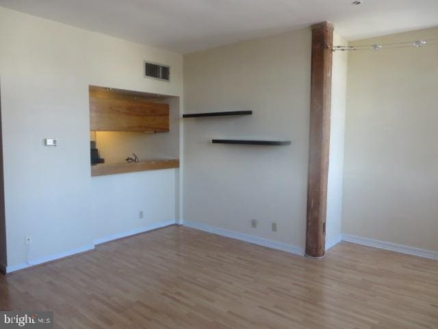 empty room featuring light wood-type flooring