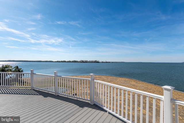 deck featuring a water view