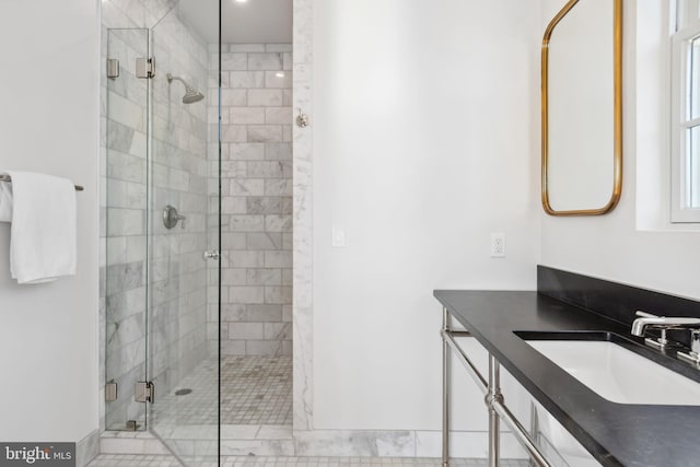 bathroom featuring vanity and a shower stall