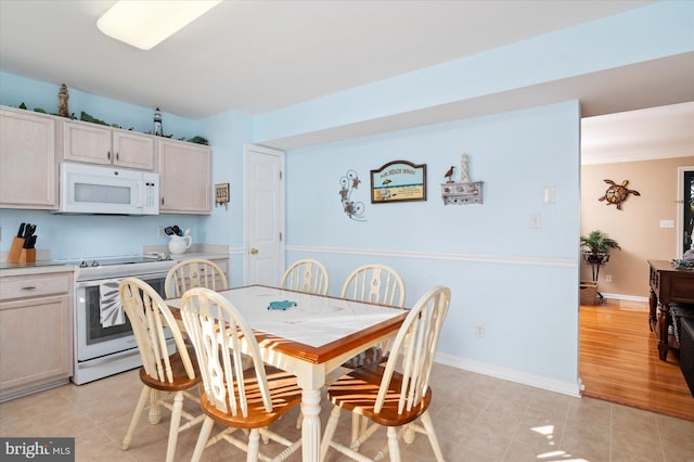 dining area featuring light hardwood / wood-style floors