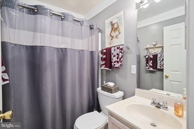 bathroom featuring curtained shower, vanity, toilet, and ornamental molding