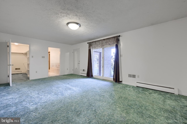 unfurnished bedroom featuring a baseboard radiator, a textured ceiling, carpet, and visible vents