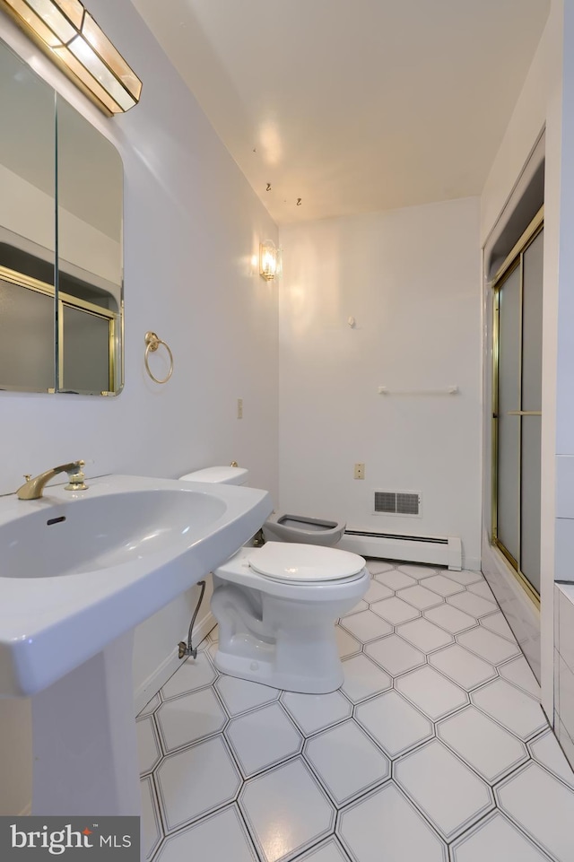 bathroom with toilet, a stall shower, tile patterned floors, visible vents, and a baseboard radiator