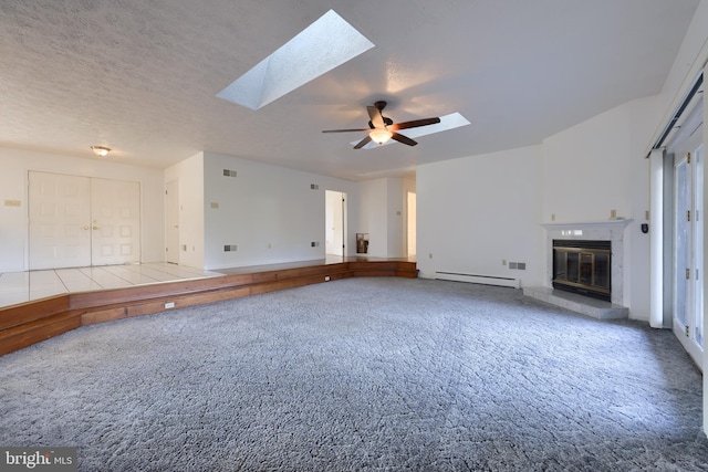 unfurnished living room with light carpet, a textured ceiling, a baseboard radiator, and ceiling fan