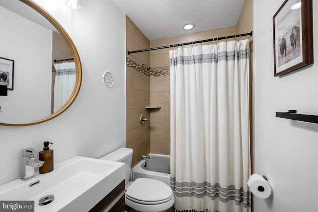 full bathroom with toilet, vanity, and shower / bath combination with curtain