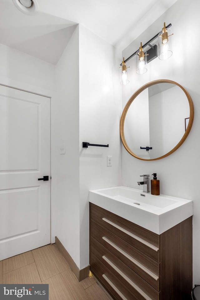 bathroom with vanity and tile patterned floors