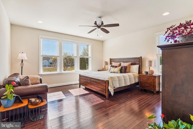 bedroom featuring dark wood-type flooring and ceiling fan