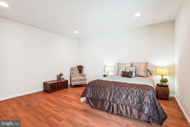 bedroom featuring hardwood / wood-style floors