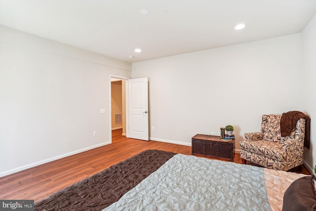 bedroom featuring hardwood / wood-style floors