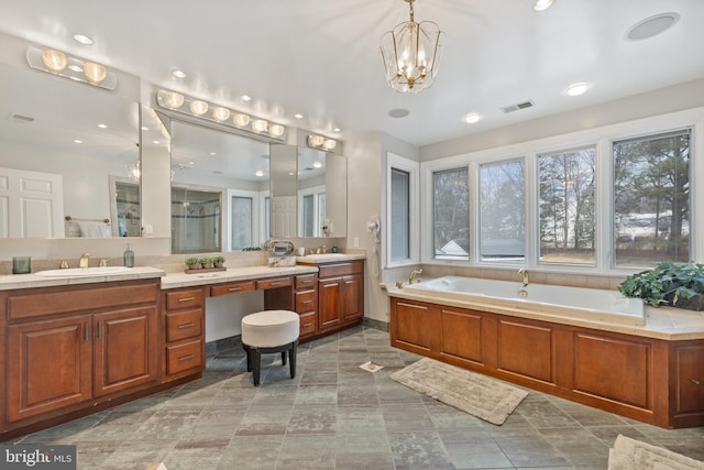 full bath featuring a shower with door, a notable chandelier, visible vents, vanity, and a bath