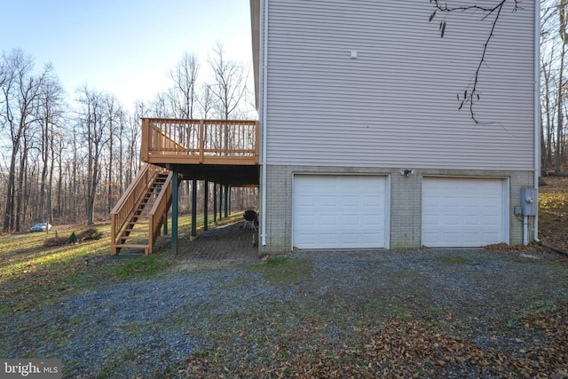 view of side of property featuring a wooden deck