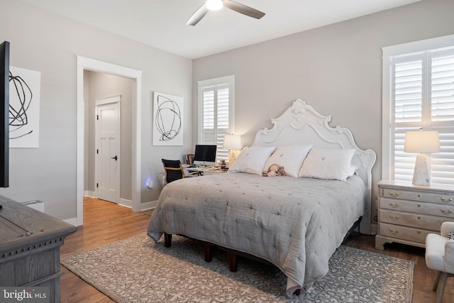 bedroom featuring ceiling fan and wood-type flooring