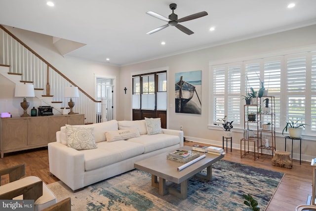 32845 Widgeon Rd Unit 11, Ocean View, DE 19970 - living room featuring stairway, wood finished floors, a ceiling fan, ornamental molding, and recessed lighting