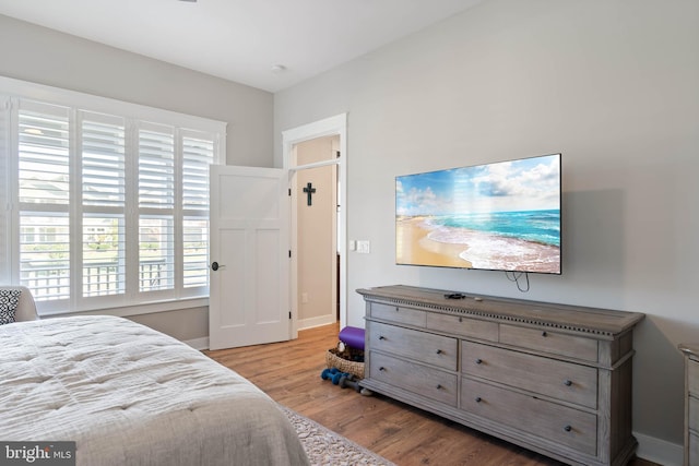 bedroom featuring light wood-type flooring