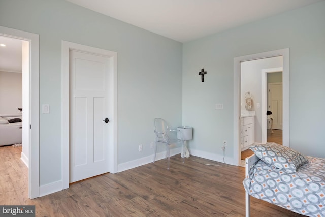 bedroom featuring hardwood / wood-style flooring