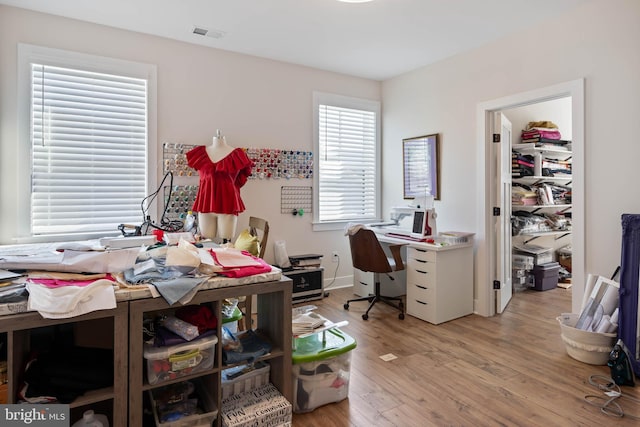 office area with hardwood / wood-style flooring