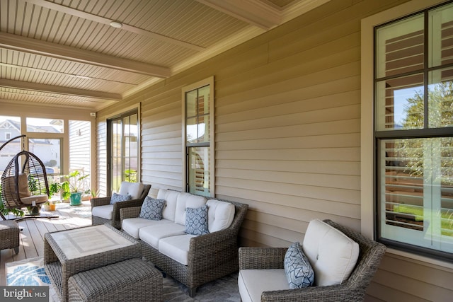 sunroom / solarium with beam ceiling and wood ceiling