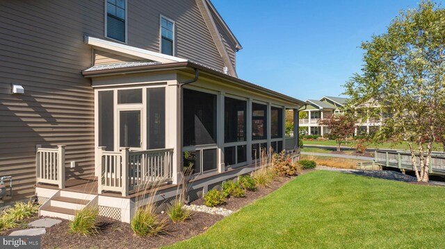32845 Widgeon Rd Unit 11, Ocean View, DE 19970 - back of property with a sunroom and a yard