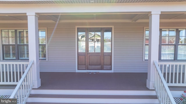 32845 Widgeon Rd Unit 11, Ocean View, DE 19970 - doorway to property featuring a porch