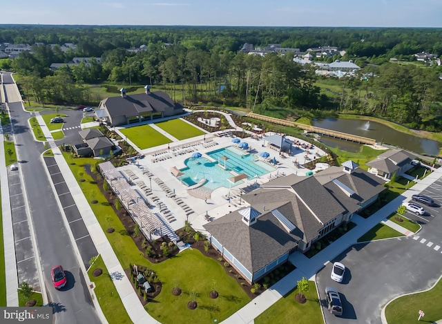 drone / aerial view with a water view