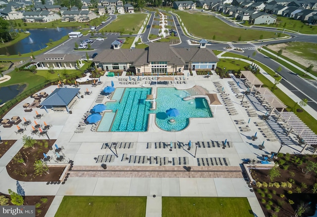 bird's eye view with a water view