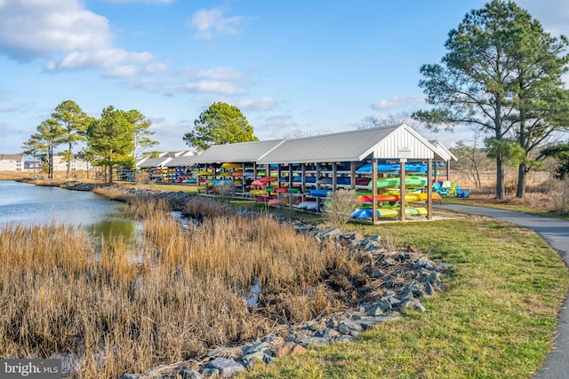 view of play area featuring a water view