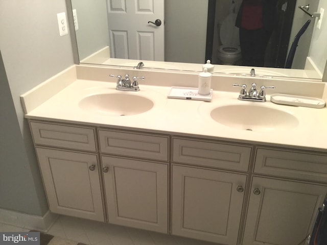 bathroom featuring vanity and tile patterned floors