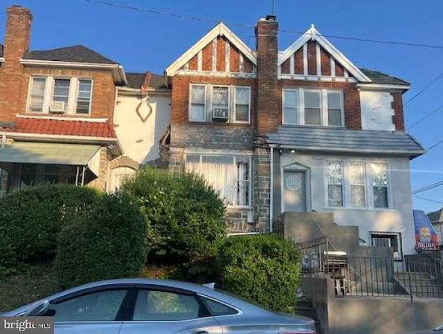 6558 N 18th St, Philadelphia, PA 19126 - townhome / multi-family property featuring stone siding and a chimney