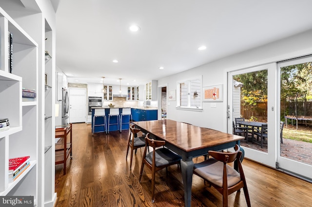 5916 Charlesmead Rd, Baltimore, MD 21212 - dining room with recessed lighting and dark wood-type flooring