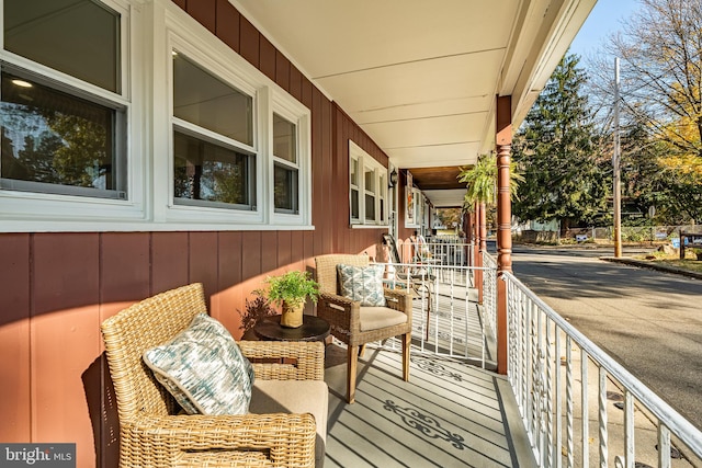 balcony featuring a porch