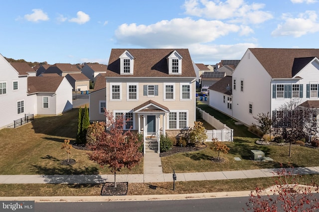 view of front of property with a front lawn