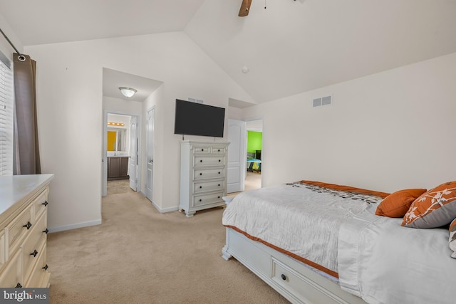 carpeted bedroom with lofted ceiling, connected bathroom, and ceiling fan