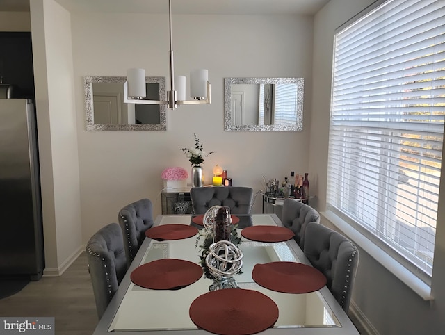 dining room with hardwood / wood-style floors