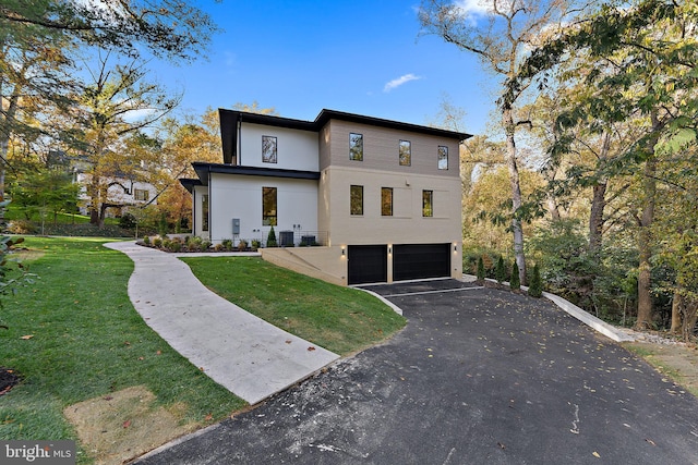 exterior space with a lawn and a garage