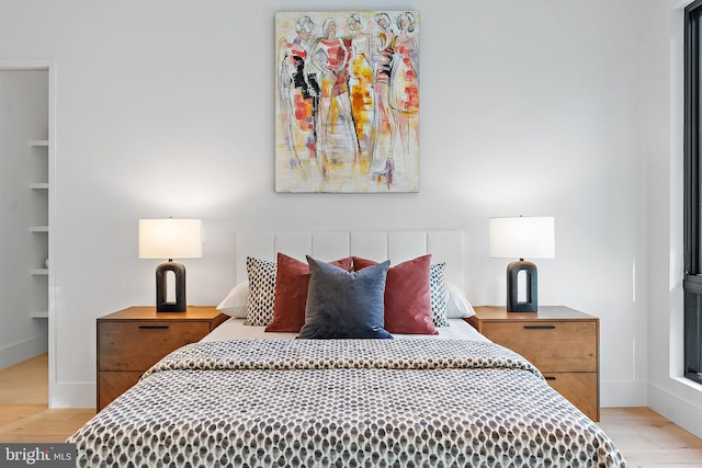 bedroom with light hardwood / wood-style flooring