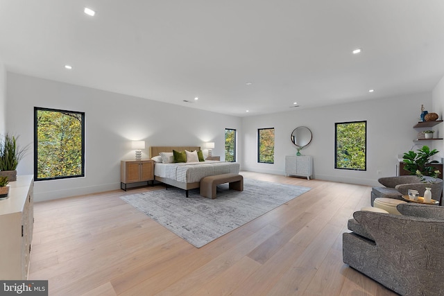 bedroom with light hardwood / wood-style flooring