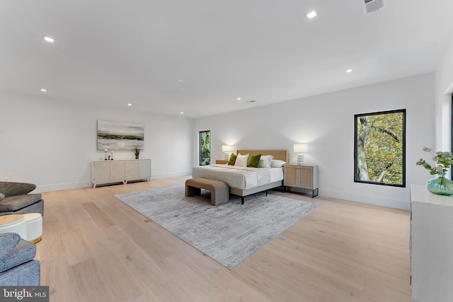 bedroom with light hardwood / wood-style floors