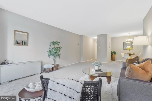 living room featuring a chandelier and light colored carpet