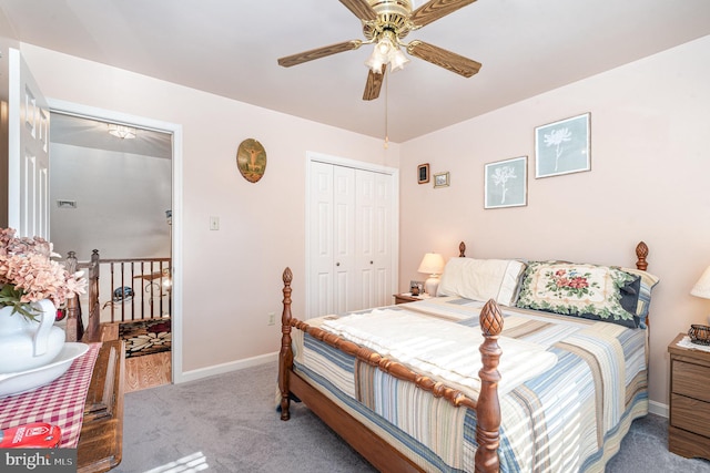 carpeted bedroom featuring a closet and ceiling fan