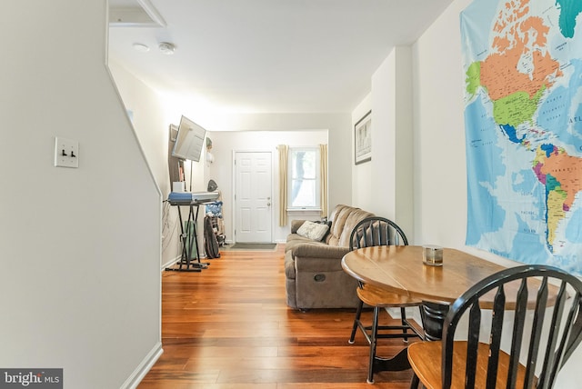 living area with hardwood / wood-style floors