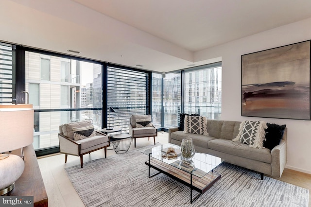 living room with light hardwood / wood-style floors