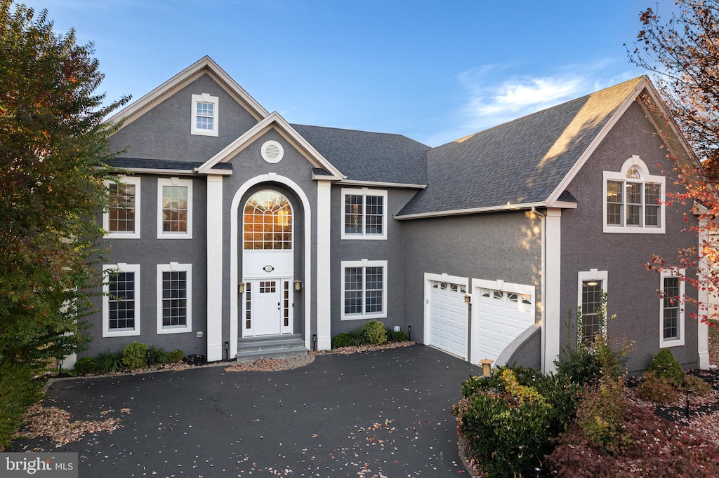 view of property featuring a garage