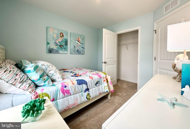 bedroom with carpet flooring and a closet