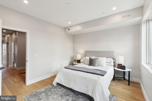 bedroom featuring light wood-type flooring